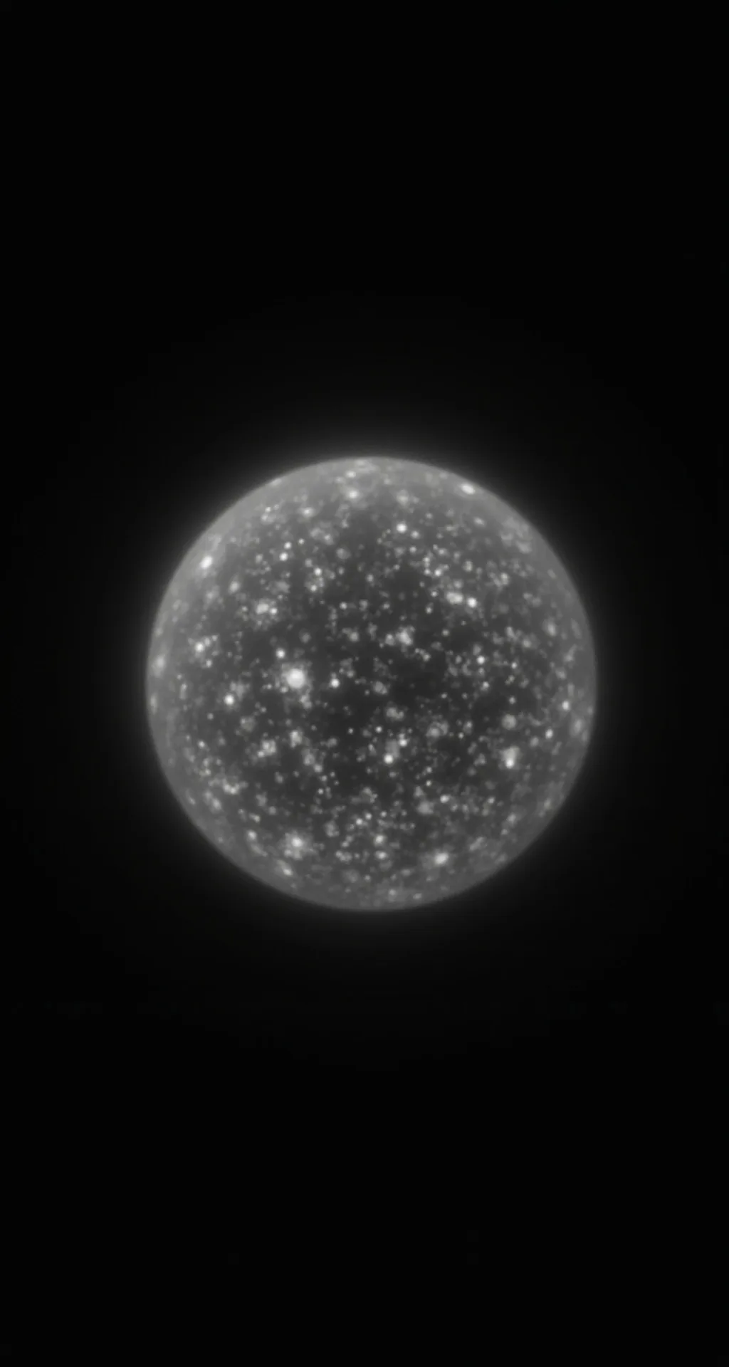 A sphere of tiny white particles in black space.