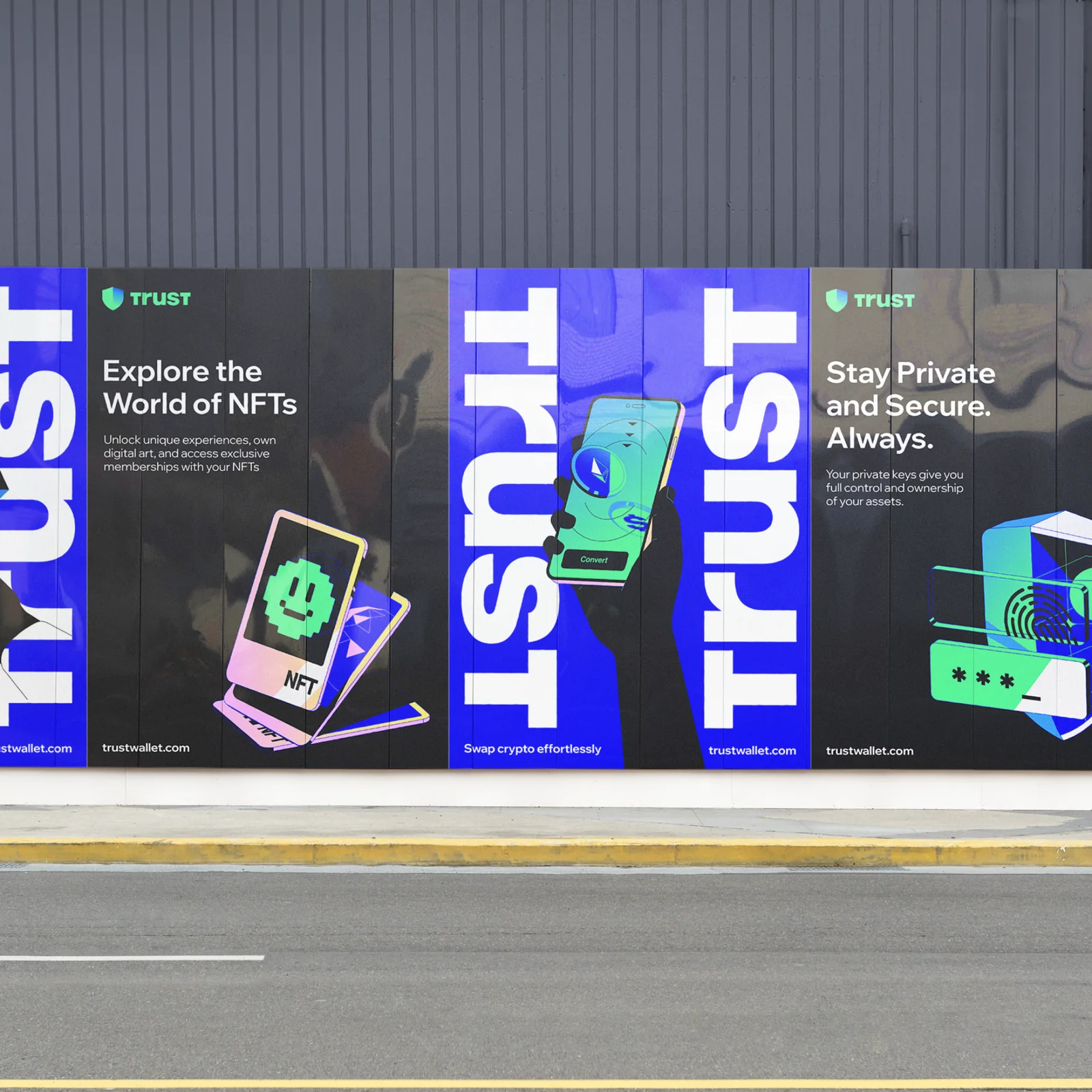 Trust posters on a street hoarding: the vertical wordmark and Explore the world of NFTs, Stay private and secure.