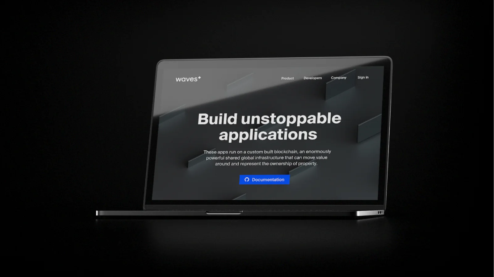 A laptop showing the Waves developer site: Build unstoppable applications.